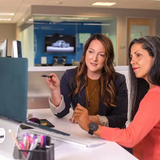 two women at a desk